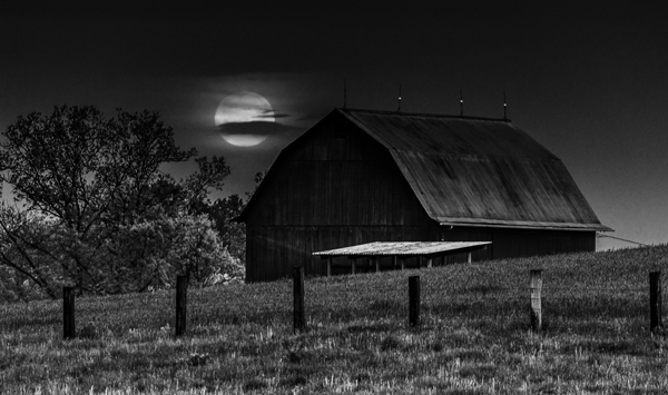 shooting the moon over a barn